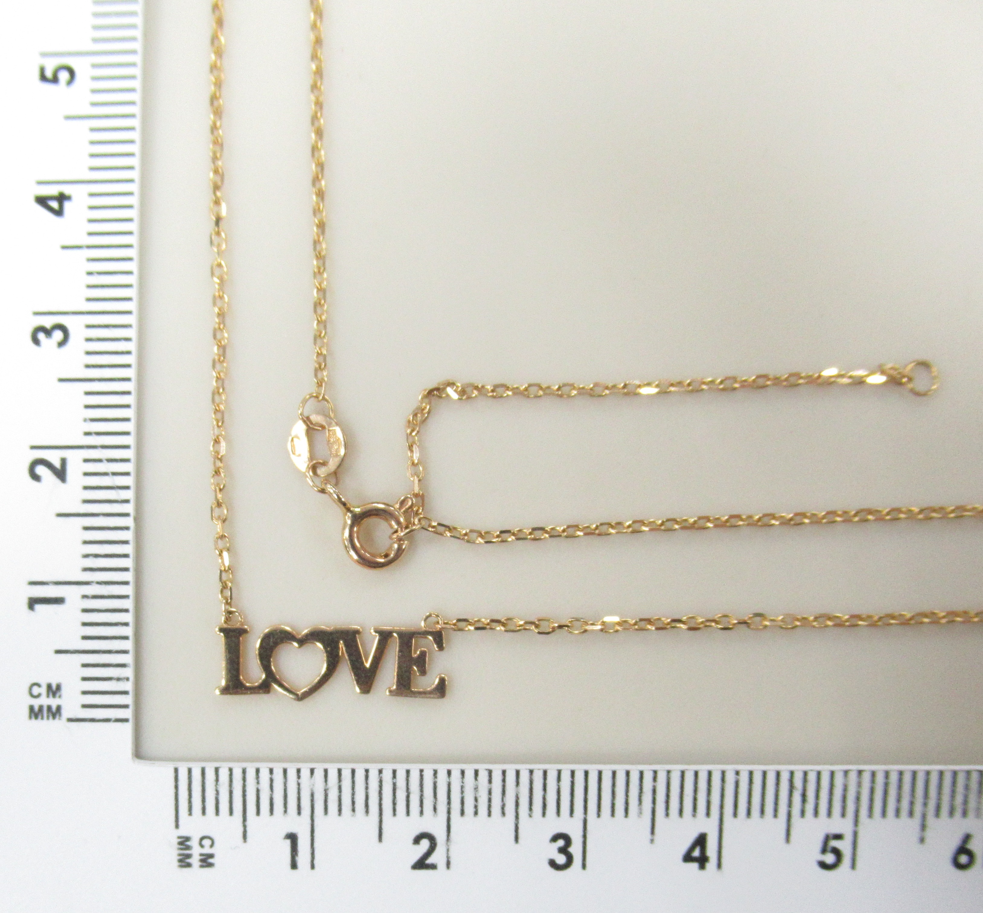 Колье из золота "Love"